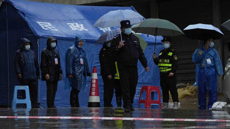 In this photo released by Xinhua News Agency, rescue workers search for the black boxes at a plane crash site in Tengxian county, southwestern China's Guangxi Zhuang Autonomous Region, Tuesday, March 22, 2022. A China Eastern flight 5735 carrying 123 passengers and nine crew members crashed outside the city of Wuzhou in the Guangxi region while flying from Kunming, the capital of the southwestern province of Yunnan, to Guangzhou, an industrial center not far from Hong Kong on China's southeastern coast. It ignited a fire big enough to be seen on NASA satellite images before firefighters could extinguished it. (Zhou Hua/Xinhua via AP)