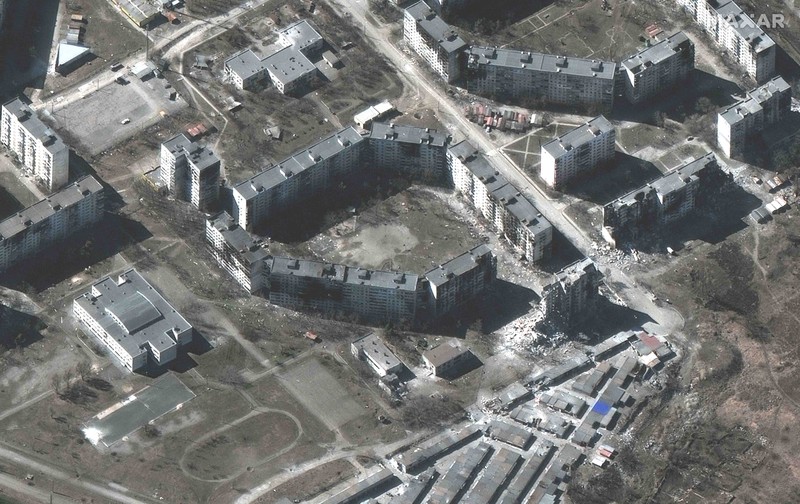 Russia Ukraine War This satellite image provided by Maxar Technologies shows burning buildings at Livoberezhnyi district in Mariupol, Ukraine Tuesday, March 22, 2022. (Satellite image ©2022 Maxar Technologies via AP)