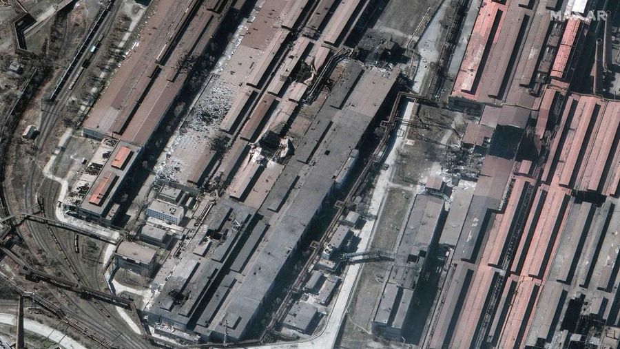 This satellite image provided by Maxar Technologies shows burning buildings at Livoberezhnyi district in Mariupol, Ukraine Tuesday, March 22, 2022. (Satellite image ©2022 Maxar Technologies via AP)