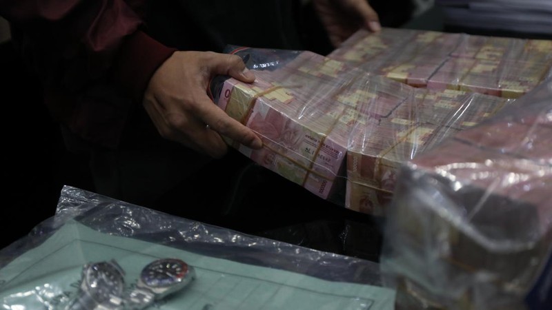 Direktorat Tindak Pidana Ekonomi Khusus (Dittipideksus) Bareskrim Polri  merilis kasus investasi bodong binary option lewat aplikasi Binomo, Jumat (25/3/2022). Tersangka Indra Kenz juga dihadirkan dalam rilis tersebut. (CNBC Indonesia/Tri Susilo)