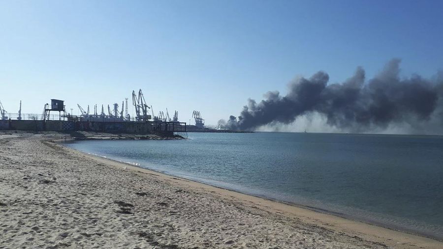 Smoke rises after shelling near a seaport in Berdyansk, Ukraine, Thursday, March 24, 2022. Ukraine's navy reported Thursday that it had sunk the Russian ship Orsk in the Sea of Asov near the port city of Berdyansk. It released photos and video of fire and thick smoke coming from the port area. Russia did not immediately comment on the claim. (AP Photo)