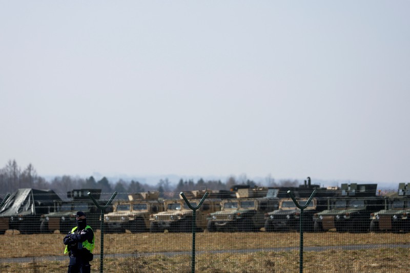 UKRAINE-CRISIS/USA-POLAND A U.S. Army Black Hawk flies over Rzeszow-Jasionka Airport ahead of U.S. President Joe Biden arrival to visit Poland, amid Russia's invasion of Ukraine, near Rzeszow, Poland, March 25, 2022. REUTERS/Kacper Pempel