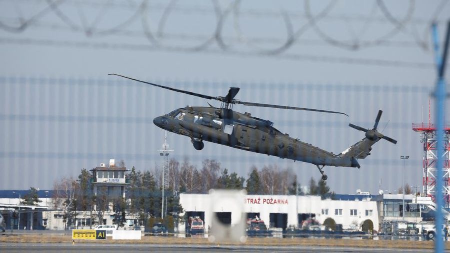 A U.S. Army Black Hawk flies over Rzeszow-Jasionka Airport ahead of U.S. President Joe Biden arrival to visit Poland, amid Russia's invasion of Ukraine, near Rzeszow, Poland, March 25, 2022. REUTERS/Kacper Pempel