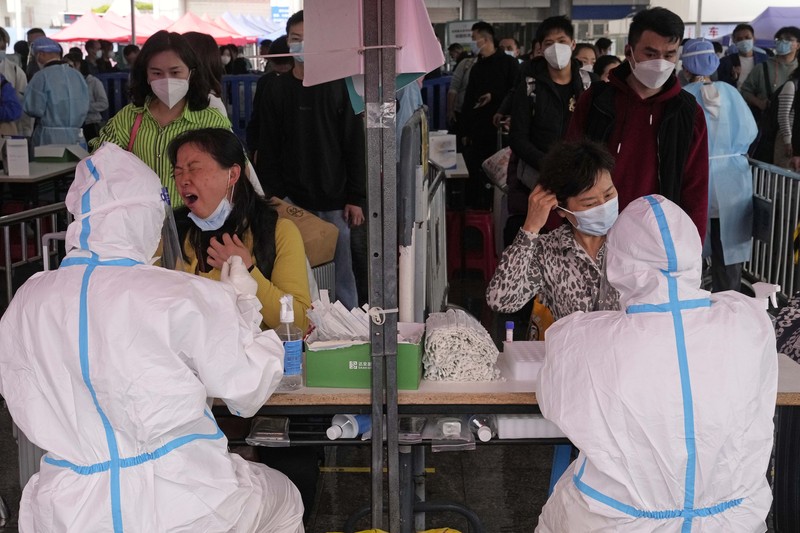Lonjakan kasus covid-19 di China (AP/Andy Wong)