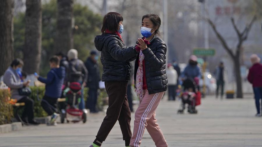 Lonjakan kasus covid-19 di China (AP/Andy Wong)