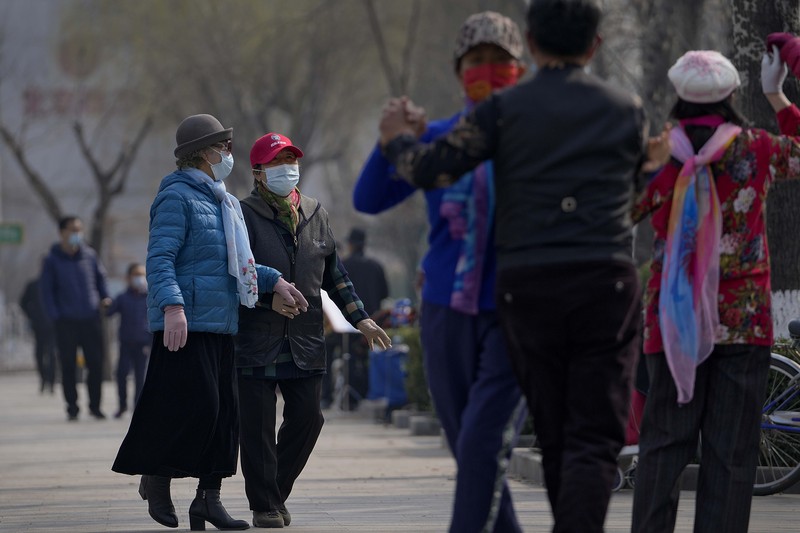 Lonjakan kasus covid-19 di China (AP/Andy Wong)