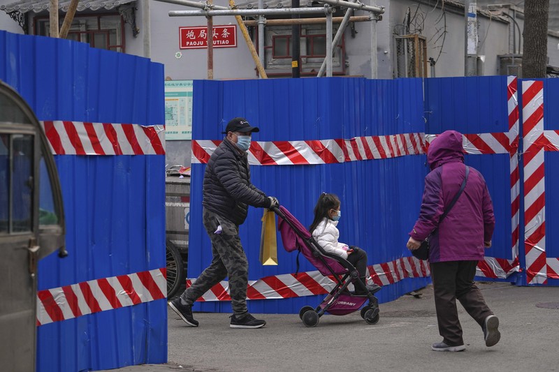 Lonjakan kasus covid-19 di China (AP/Andy Wong)