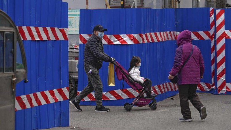 Lonjakan kasus covid-19 di China (AP/Andy Wong)