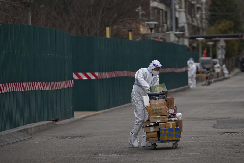 Lonjakan kasus covid-19 di China (AP/Andy Wong)