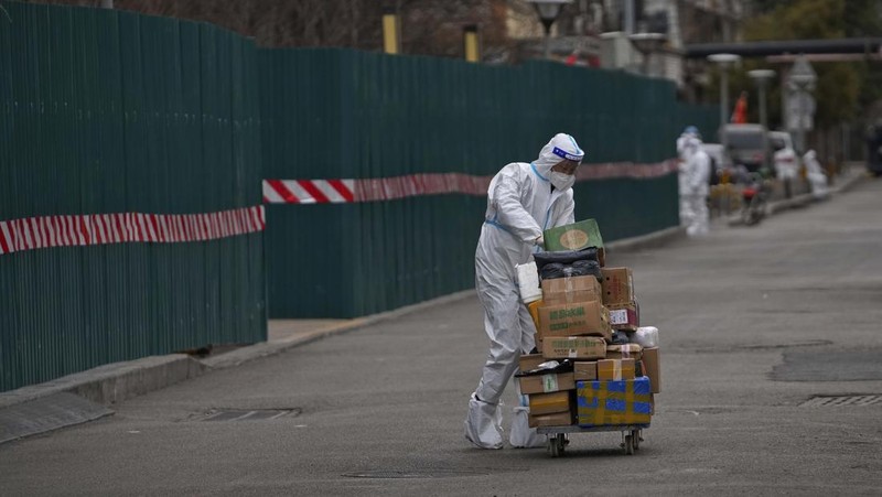 Lonjakan kasus covid-19 di China (AP/Andy Wong)