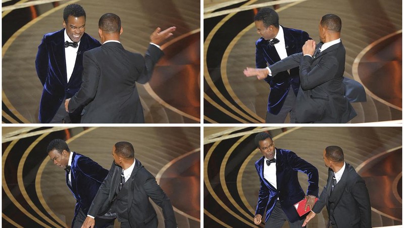 Will Smith memukul Chris Rock saat Rock berbicara di atas panggung selama Academy Awards ke-94 di Hollywood, Los Angeles, California, AS, Minggu (27/3/2022). (REUTERS/Brian Snyder)