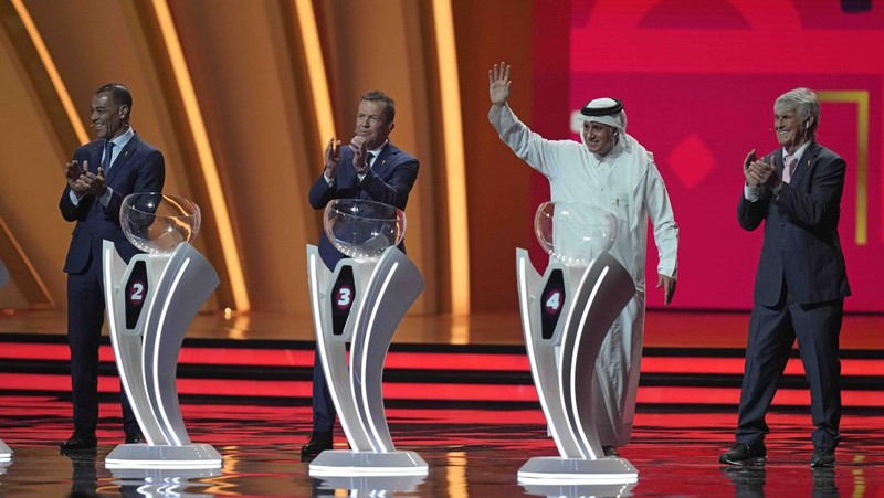 Emir of Qatar Sheikh Tamim bin Hamad Al Thani speaks during the 2022 soccer World Cup draw at the Doha Exhibition and Convention Center in Doha, Qatar, Friday, April 1, 2022. (AP Photo/Hussein Sayed)