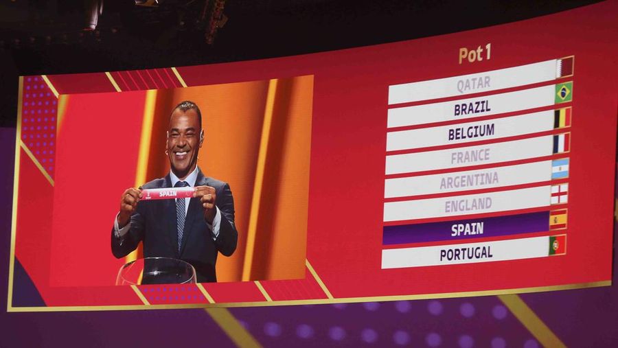 Emir of Qatar Sheikh Tamim bin Hamad Al Thani speaks during the 2022 soccer World Cup draw at the Doha Exhibition and Convention Center in Doha, Qatar, Friday, April 1, 2022. (AP Photo/Hussein Sayed)