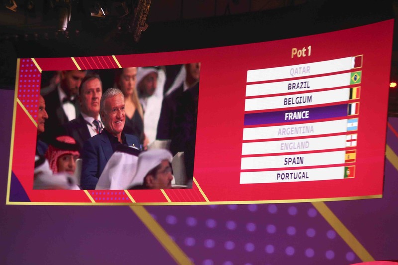 Qatar Soccer WCup Draw Emir of Qatar Sheikh Tamim bin Hamad Al Thani speaks during the 2022 soccer World Cup draw at the Doha Exhibition and Convention Center in Doha, Qatar, Friday, April 1, 2022. (AP Photo/Hussein Sayed)