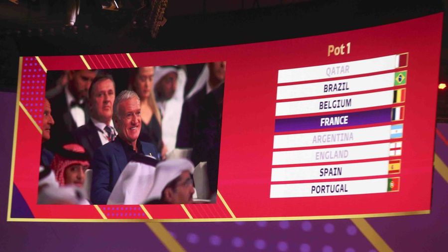 Emir of Qatar Sheikh Tamim bin Hamad Al Thani speaks during the 2022 soccer World Cup draw at the Doha Exhibition and Convention Center in Doha, Qatar, Friday, April 1, 2022. (AP Photo/Hussein Sayed)