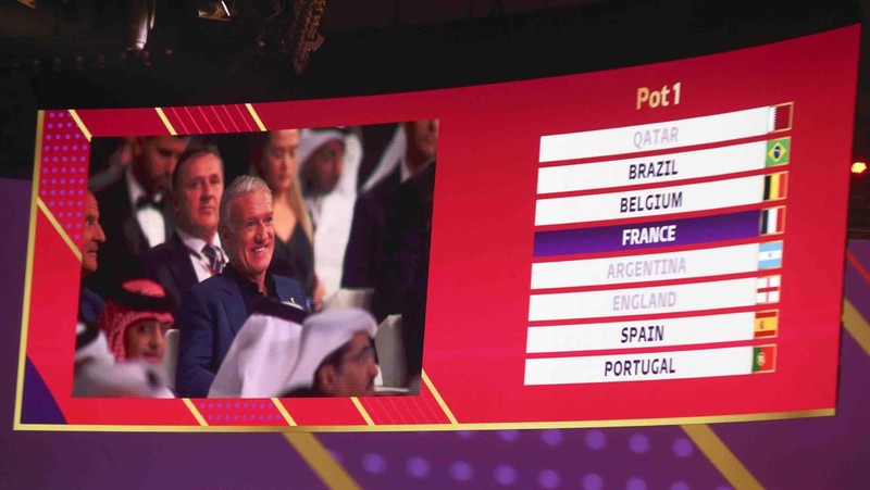 Emir of Qatar Sheikh Tamim bin Hamad Al Thani speaks during the 2022 soccer World Cup draw at the Doha Exhibition and Convention Center in Doha, Qatar, Friday, April 1, 2022. (AP Photo/Hussein Sayed)