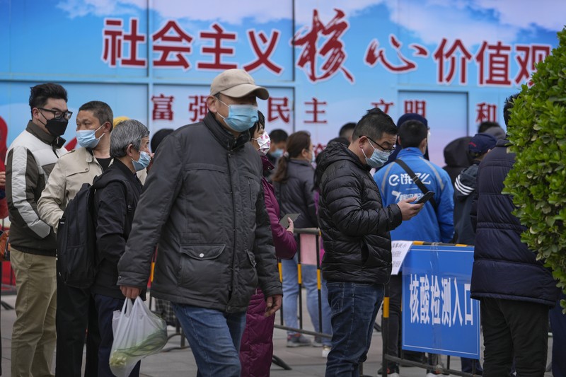 Lonjakan kasus covid-19 di China (AP/Andy Wong) Lonjakan kasus covid-19 di China (AP/Andy Wong)