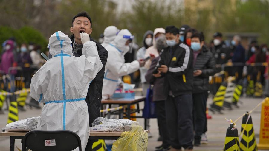 Lonjakan kasus covid-19 di China (AP/Andy Wong)