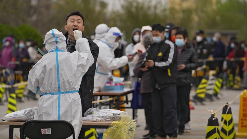 Lonjakan kasus covid-19 di China (AP/Andy Wong)