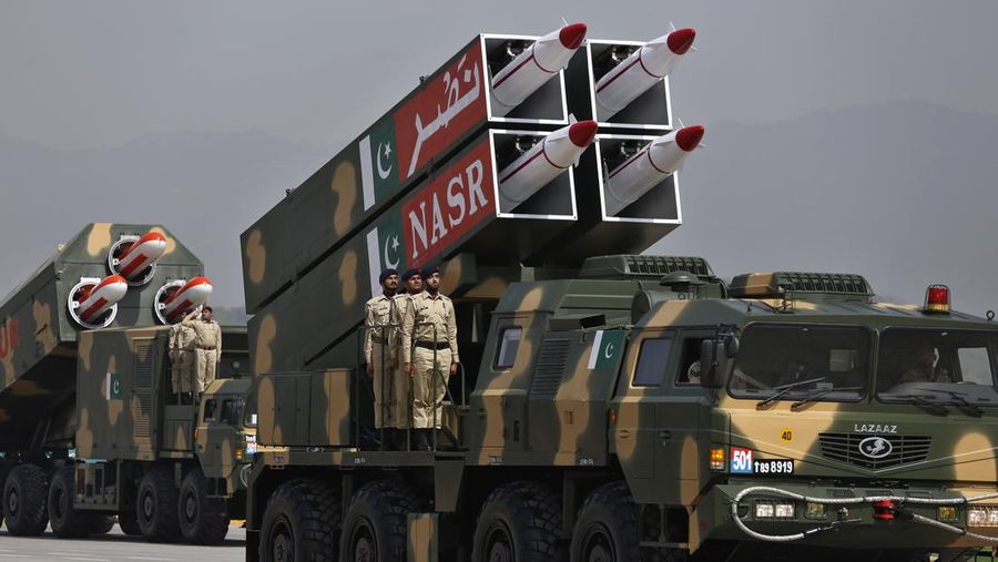 A Pakistani-made ballistic missile NASR is carried on a trailer is on display at a military parade in connection with Pakistan National Day celebrations, in Islamabad, Pakistan, Thursday, March 25, 2021. The military parade in the capital showcased short and long-range missiles, tanks, jets drones and other hardware. (AP Photo/Anjum Naveed)