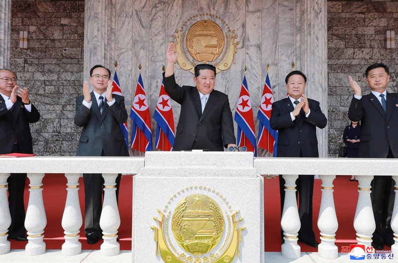NORTHKOREA-ANNIVERSARY/ Fireworks go off in the sky as people take part in an event at Kim Il Sung Square to mark 110th birth anniversary of the state's founder, Kim II Sung, in Pyongyang, North Korea, April 15, 2022. Picture taken April 15, 2022 by North Korea's Korean Central News Agency (KCNA). KCNA via REUTERS ATTENTION EDITORS - THIS IMAGE WAS PROVIDED BY A THIRD PARTY. REUTERS IS UNABLE TO INDEPENDENTLY VERIFY THIS IMAGE. NO THIRD PARTY SALES. SOUTH KOREA OUT. NO COMMERCIAL OR EDITORIAL SALES IN SOUTH KOREA.