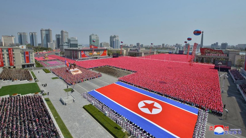 Fireworks go off in the sky as people take part in an event at Kim Il Sung Square to mark 110th birth anniversary of the state's founder, Kim II Sung, in Pyongyang, North Korea, April 15, 2022. Picture taken April 15, 2022 by North Korea's Korean Central News Agency (KCNA).     KCNA via REUTERS    ATTENTION EDITORS - THIS IMAGE WAS PROVIDED BY A THIRD PARTY. REUTERS IS UNABLE TO INDEPENDENTLY VERIFY THIS IMAGE. NO THIRD PARTY SALES. SOUTH KOREA OUT. NO COMMERCIAL OR EDITORIAL SALES IN SOUTH KOREA.