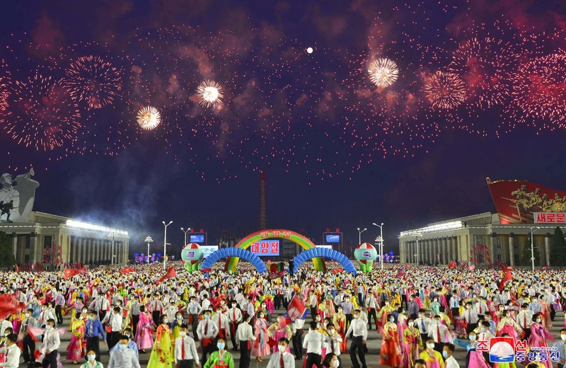 Fireworks go off in the sky as people take part in an event at Kim Il Sung Square to mark 110th birth anniversary of the state's founder, Kim II Sung, in Pyongyang, North Korea, April 15, 2022. Picture taken April 15, 2022 by North Korea's Korean Central News Agency (KCNA).     KCNA via REUTERS    ATTENTION EDITORS - THIS IMAGE WAS PROVIDED BY A THIRD PARTY. REUTERS IS UNABLE TO INDEPENDENTLY VERIFY THIS IMAGE. NO THIRD PARTY SALES. SOUTH KOREA OUT. NO COMMERCIAL OR EDITORIAL SALES IN SOUTH KOREA.