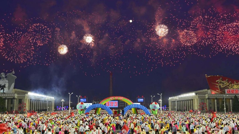 Fireworks go off in the sky as people take part in an event at Kim Il Sung Square to mark 110th birth anniversary of the state's founder, Kim II Sung, in Pyongyang, North Korea, April 15, 2022. Picture taken April 15, 2022 by North Korea's Korean Central News Agency (KCNA).     KCNA via REUTERS    ATTENTION EDITORS - THIS IMAGE WAS PROVIDED BY A THIRD PARTY. REUTERS IS UNABLE TO INDEPENDENTLY VERIFY THIS IMAGE. NO THIRD PARTY SALES. SOUTH KOREA OUT. NO COMMERCIAL OR EDITORIAL SALES IN SOUTH KOREA.