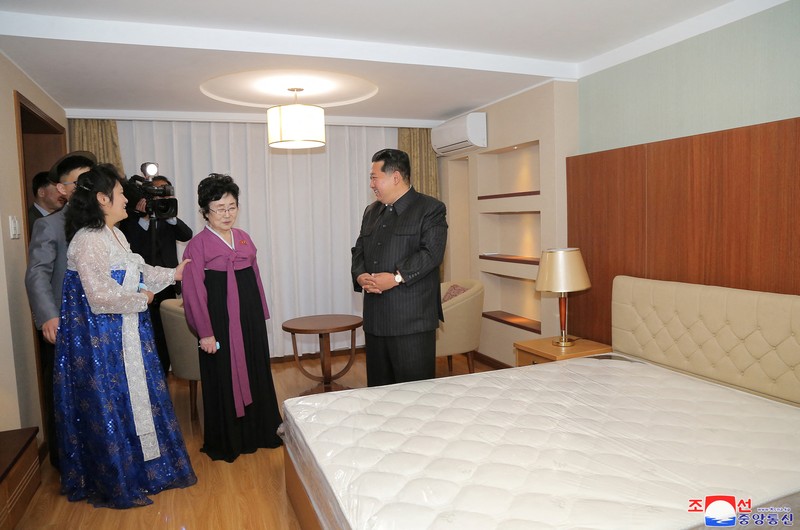 NORTHKOREA-APARTMENTS/ North Korean leader Kim Jong Un attends a tape-cutting ceremony to mark the completion of a terraced residential district on a bank of the Pothong River in Pyongyang, North Korea, April 13, 2022. Picture taken April 13, 2022 by North Korea's Korean Central News Agency (KCNA). KCNA via REUTERS ATTENTION EDITORS - THIS IMAGE WAS PROVIDED BY A THIRD PARTY. REUTERS IS UNABLE TO INDEPENDENTLY VERIFY THIS IMAGE. NO THIRD PARTY SALES. SOUTH KOREA OUT. NO COMMERCIAL OR EDITORIAL SALES IN SOUTH KOREA.