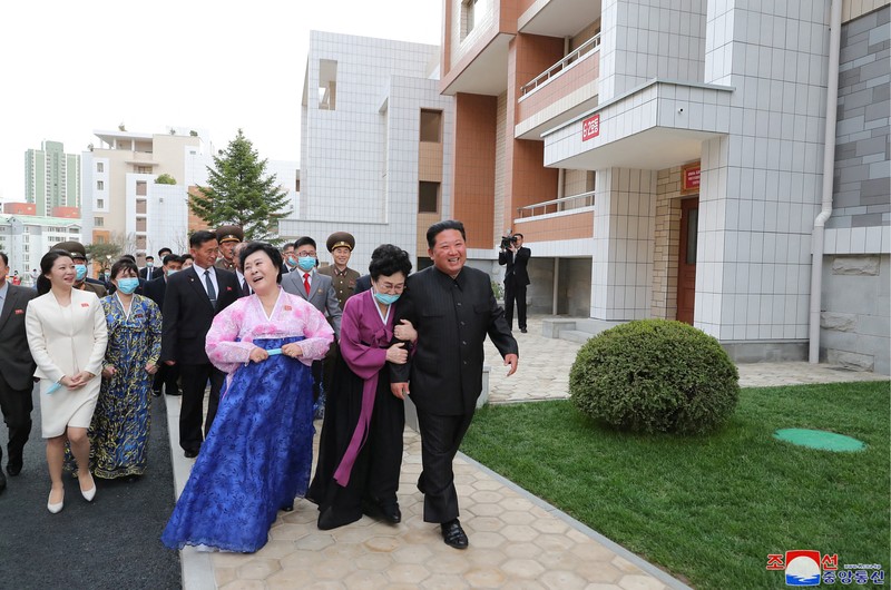 NORTHKOREA-APARTMENTS/ North Korean leader Kim Jong Un attends a tape-cutting ceremony to mark the completion of a terraced residential district on a bank of the Pothong River in Pyongyang, North Korea, April 13, 2022. Picture taken April 13, 2022 by North Korea's Korean Central News Agency (KCNA). KCNA via REUTERS ATTENTION EDITORS - THIS IMAGE WAS PROVIDED BY A THIRD PARTY. REUTERS IS UNABLE TO INDEPENDENTLY VERIFY THIS IMAGE. NO THIRD PARTY SALES. SOUTH KOREA OUT. NO COMMERCIAL OR EDITORIAL SALES IN SOUTH KOREA.