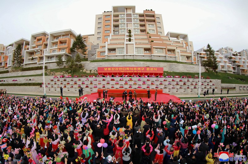 North Korean leader Kim Jong Un attends a tape-cutting ceremony to mark the completion of a terraced residential district on a bank of the Pothong River in Pyongyang, North Korea, April 13, 2022. Picture taken April 13, 2022 by North Korea's Korean Central News Agency (KCNA). KCNA via REUTERS ATTENTION EDITORS - THIS IMAGE WAS PROVIDED BY A THIRD PARTY. REUTERS IS UNABLE TO INDEPENDENTLY VERIFY THIS IMAGE. NO THIRD PARTY SALES. SOUTH KOREA OUT. NO COMMERCIAL OR EDITORIAL SALES IN SOUTH KOREA.