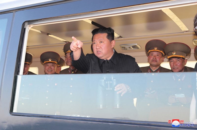 NORTHKOREA-MISSILES/ North Korean leader Kim Jong Un gestures as he watches the test-firing of a new-type tactical guided weapon according to state media, North Korea, in this undated photo released on April 16, 2022 by North Korea's Korean Central News Agency (KCNA). KCNA via REUTERS ATTENTION EDITORS - THIS IMAGE WAS PROVIDED BY A THIRD PARTY. REUTERS IS UNABLE TO INDEPENDENTLY VERIFY THIS IMAGE. NO THIRD PARTY SALES. SOUTH KOREA OUT. NO COMMERCIAL OR EDITORIAL SALES IN SOUTH KOREA.