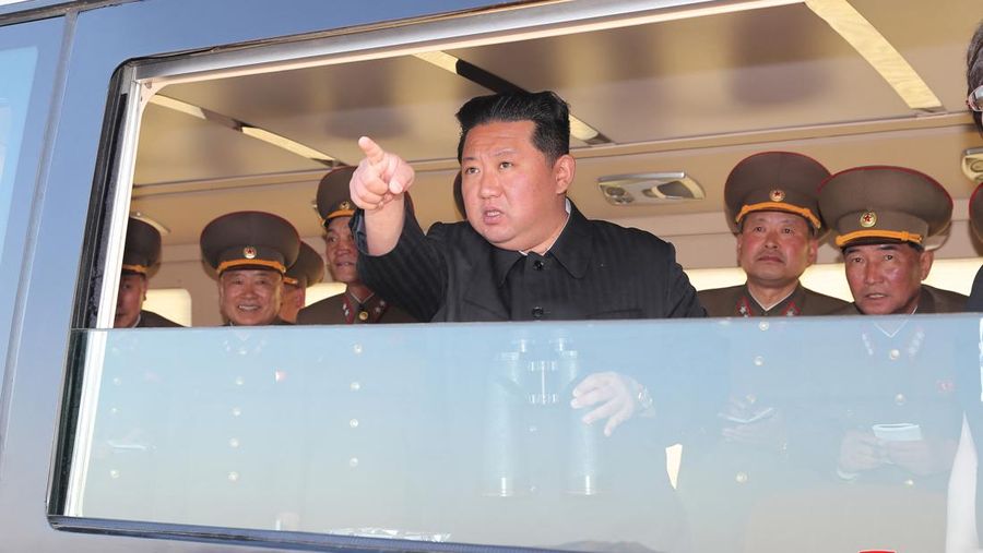 North Korean leader Kim Jong Un gestures as he watches the test-firing of a new-type tactical guided weapon according to state media, North Korea, in this undated photo released on April 16, 2022 by North Korea's Korean Central News Agency (KCNA). KCNA via REUTERS ATTENTION EDITORS - THIS IMAGE WAS PROVIDED BY A THIRD PARTY. REUTERS IS UNABLE TO INDEPENDENTLY VERIFY THIS IMAGE. NO THIRD PARTY SALES. SOUTH KOREA OUT. NO COMMERCIAL OR EDITORIAL SALES IN SOUTH KOREA.