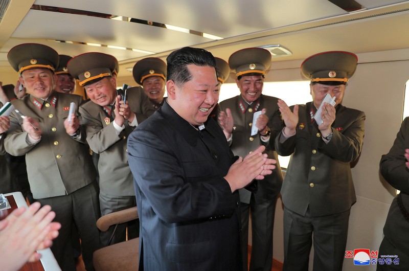 NORTHKOREA-MISSILES/ North Korean leader Kim Jong Un gestures as he watches the test-firing of a new-type tactical guided weapon according to state media, North Korea, in this undated photo released on April 16, 2022 by North Korea's Korean Central News Agency (KCNA). KCNA via REUTERS ATTENTION EDITORS - THIS IMAGE WAS PROVIDED BY A THIRD PARTY. REUTERS IS UNABLE TO INDEPENDENTLY VERIFY THIS IMAGE. NO THIRD PARTY SALES. SOUTH KOREA OUT. NO COMMERCIAL OR EDITORIAL SALES IN SOUTH KOREA.