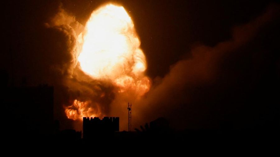 An explosion is caused by Israeli airstrikes on a Hamas military base in town of Khan Younis, southern Gaza Strip, Tuesday April 19, 2022. (AP Photo/Yousef Masoud)