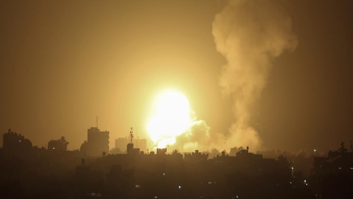 An explosion is caused by Israeli airstrikes on a Hamas military base in town of Khan Younis, southern Gaza Strip, Tuesday April 19, 2022. (AP Photo/Yousef Masoud)