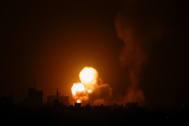 Israel Palestinians An explosion is caused by Israeli airstrikes on a Hamas military base in town of Khan Younis, southern Gaza Strip, Tuesday April 19, 2022. (AP Photo/Yousef Masoud)
