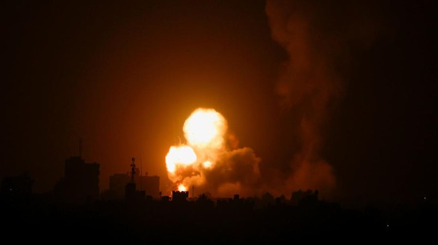 An explosion is caused by Israeli airstrikes on a Hamas military base in town of Khan Younis, southern Gaza Strip, Tuesday April 19, 2022. (AP Photo/Yousef Masoud)
