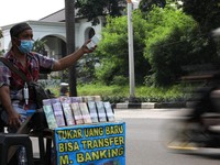 Jasa Tukar Uang Baru Kena Pajak? Ini Penjelasannya