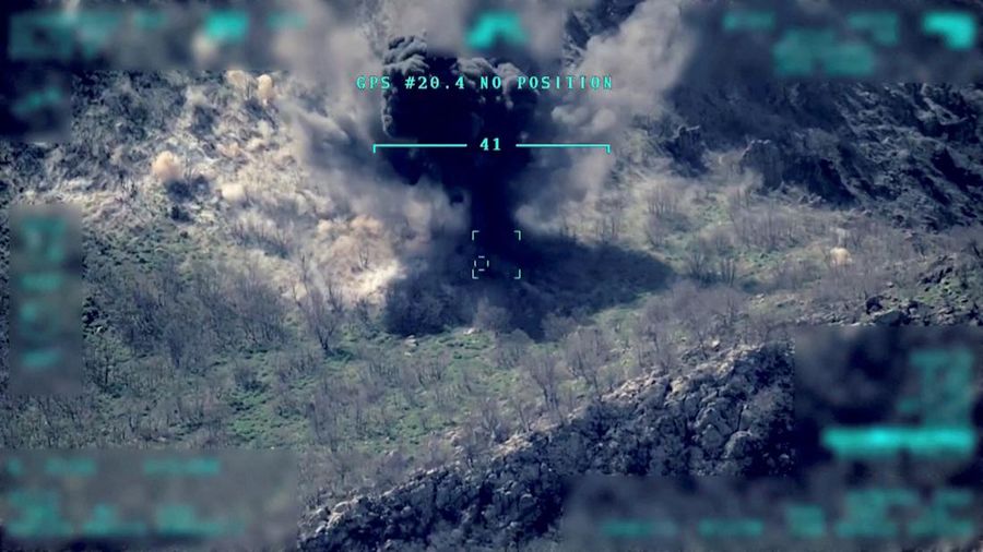 View of a target being hit during a military operation, in this still image taken from a handout video at an unknown location released on April 18, 2022. Turkish Defence Ministry/Handout via REUTERS    THIS IMAGE HAS BEEN SUPPLIED BY A THIRD PARTY  NO RESALES. NO ARCHIVES.   IMAGE WAS DIGITALLY MASKED AT SOURCE