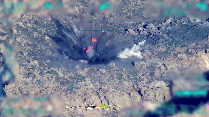 TURKEY-IRAQ/ View of a target being hit during a military operation, in this still image taken from a handout video at an unknown location released on April 18, 2022. Turkish Defence Ministry/Handout via REUTERS THIS IMAGE HAS BEEN SUPPLIED BY A THIRD PARTY NO RESALES. NO ARCHIVES. IMAGE WAS DIGITALLY MASKED AT SOURCE