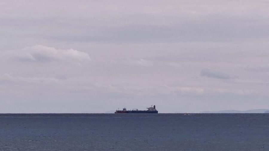 The seized Russian-flagged oil tanker Pegas is seen anchored off the shore of Karystos, on the Island of Evia, Greece, April 19, 2022. REUTERS/Vassilis Triandafyllou REFILE - CORRECTING YEAR