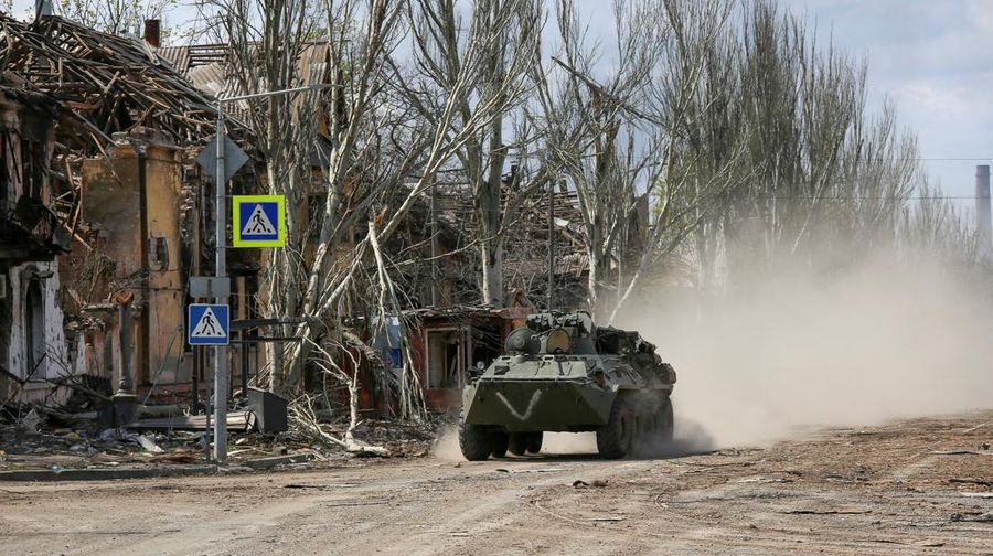 A view shows barriers made of vehicles on a road during Ukraine-Russia conflict in the southern port city of Mariupol, Ukraine April 21, 2022. REUTERS/Chingis Kondarov