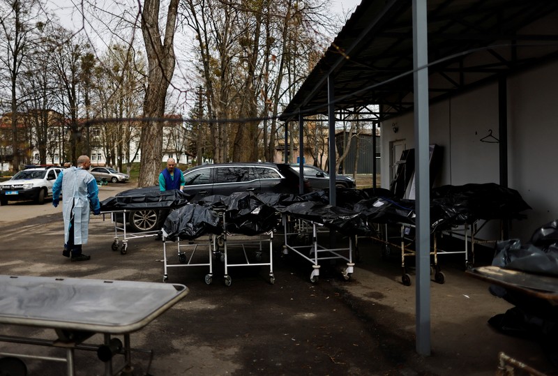 Ukraina mengautopsi ribuan jasad diduga warga sipil yang ditemukan di sekitar ibu kota Kyiv. (REUTERS/ZOHRA BENSEMRA) Ukraina mengautopsi ribuan jasad diduga warga sipil yang ditemukan di sekitar ibu kota Kyiv. (REUTERS/ZOHRA BENSEMRA)