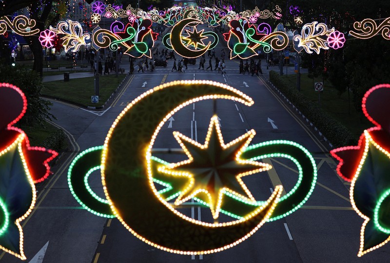 RELIGION-RAMADAN/SINGAPORE Festive lighting decorates the streets in Geylang Serai, ahead of Eid al-Fitr, also known as Hari Raya Puasa, in Singapore April 29, 2022. Picture taken April 29, 2022. REUTERS/Edgar Su TPX IMAGES OF THE DAY