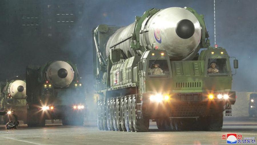 Hwasong-17 intercontinental ballistic missiles take part in a nighttime military parade to mark the 90th anniversary of the founding of the Korean People's Revolutionary Army in Pyongyang, North Korea, April 26. KCNA via REUTERS