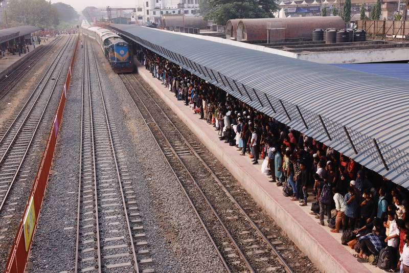 People sit onboard passenger ferries to travel home to celebrate Eid al-fitr, at the Sadarghat Launch Terminal, in Dhaka, Bangladesh, April 30, 2022. REUTERS/Mohammad Ponir Hossain