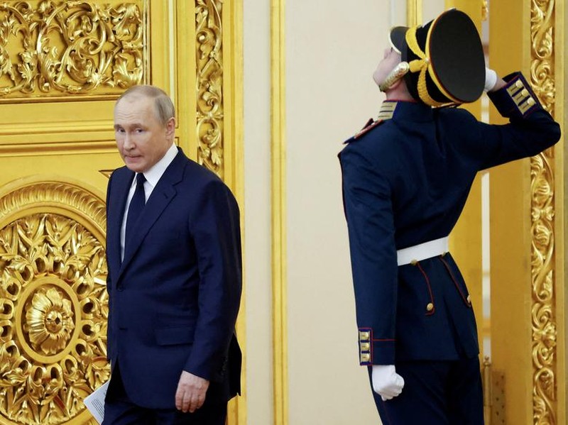 Russian President Vladimir Putin walks past a guard during a ceremony honoring the country's Olympians and Paralympians at the Kremlin in Moscow, Russia, April 26. REUTERS/Maxim Shemetov Russian President Vladimir Putin walks past a guard during a ceremony honoring the country's Olympians and Paralympians at the Kremlin in Moscow, Russia, April 26. REUTERS/Maxim Shemetov