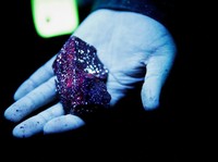 Tungsten is illuminated with mineral light in a mine in Gangwon Province, South Korea, March 31, 2022. Picture taken March 31, 2022. REUTERS/ Heo Ran