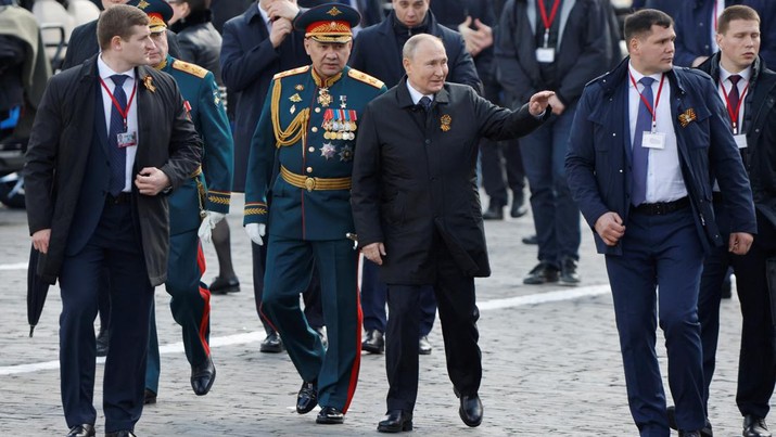 Russian President Vladimir Putin and Defence Minister Sergei Shoigu walk after a military parade on Victory Day, which marks the 77th anniversary of the victory over Nazi Germany in World War Two, in Red Square in central Moscow, Russia May 9, 2022. REUTERS/Maxim Shemetov